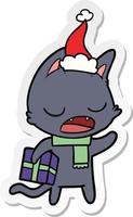 talking cat sticker cartoon of a wearing santa hat vector