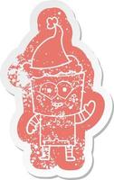 happy cartoon distressed sticker of a robot waving hello wearing santa hat vector