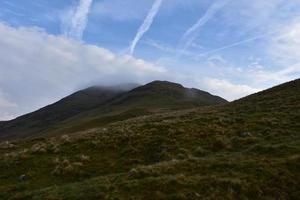 Blue Skies with Clouds Over Kidsty Pike photo