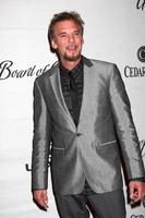 LOS ANGELES, NOV 18 - Kenny Loggins arrives at the 2010 Cedars-Sinai Board Of Governors Gala at Century Plaza Hyatt Regency Hotel on November 18, 2010 in Century City, CA photo