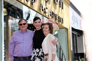 LOS ANGELES, MAY 1 -  Robert King, Julianna Margulies, Michelle King at the Julianna Margulies Hollywood Walk of Fame Star Ceremony at the Hollywood Boulevard on May 1, 2015 in Los Angeles, CA photo