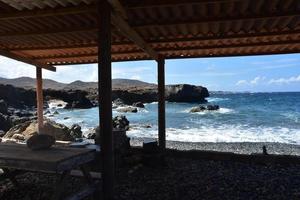 Structure Creating Shade on the Coast of Black Stone Beach photo