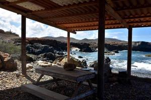 Shelter on Black Stone Beach in Aruba photo