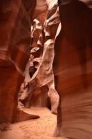 Sun Shining on the Walls of a Red Sandstone Slot Canyon photo