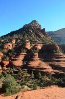 Rock Formation Dotted with Trees in Sedona Arizona photo