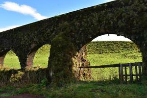 Archways in an Aqueduct in the Countryside of Azores photo