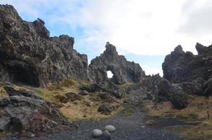 Dritvik Rock Formations on a Black Sand Beach photo