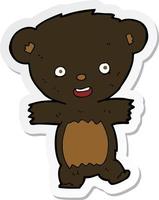 sticker of a cartoon teddy black bear cub vector