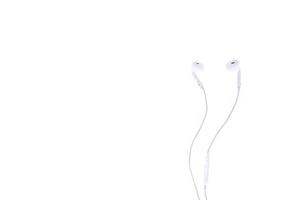white earphones isolated on white background photo