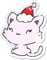 christmas distressed sticker cartoon of kawaii cat vector