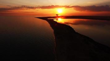 An aerial view of a beautiful sunset over the sea photo