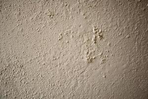 Paint peeling plaster walls because of its use for a long time. Alternatively, use quality color to paint the walls. Must be repaired in order to come back again. photo