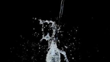 Abstract water jet crashes on a black background photo