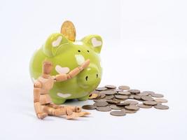 puppet doll and piggy bank ,isolate white background with clipping path photo