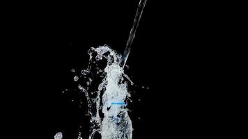 Abstract water jet crashes on a black background photo