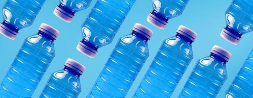 Eco banner. Concept of environmental protection and segregation of plastic waste. Plastic bottles on a blue background. photo