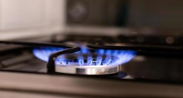 Gas stove. Concept of gas problems in the world. photo