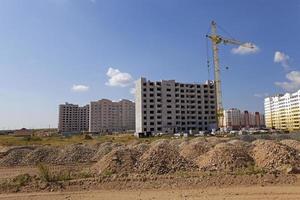 a construction site on which construction of a new multystoried house is carried out. photo