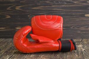 a pair of red boxing gloves photo