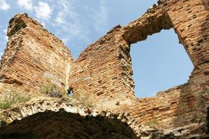 destroyed brick wall photo