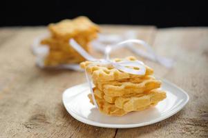 Many cookies on the wooden table photo