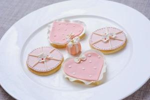 pink cookies on plate photo