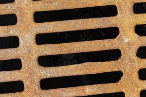 sewer grating, close up photo