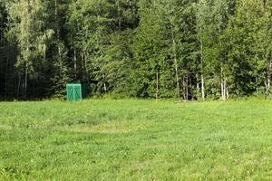 wooden toilet, forest photo