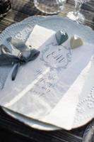 Wedding card on a plate photo