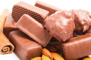 Chocolate candy with peanuts and almonds photo