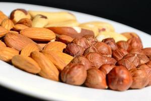 nuts on a white plate photo