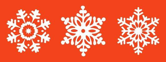 three snowflakes on a red background red vector