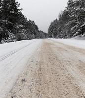 Winter road under the snow photo