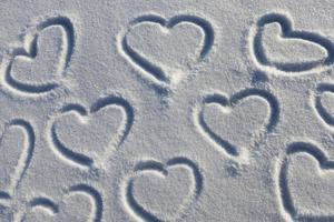 drawn in the winter season, the heart on the snow photo