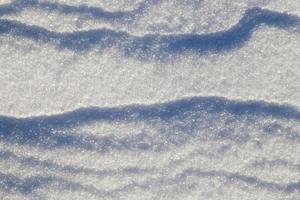 Snow drifts in winter photo