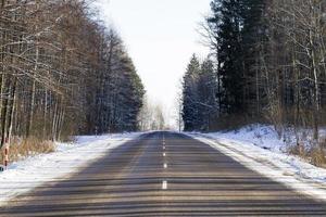 wide paved winter road photo