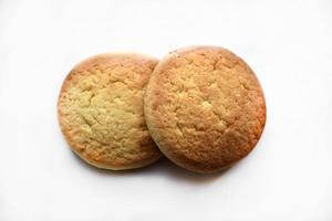 Round sweet shortbread cookies on a white background photo