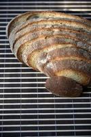 Sliced rye delicious bread on a mat. Lunch bread close-up. photo