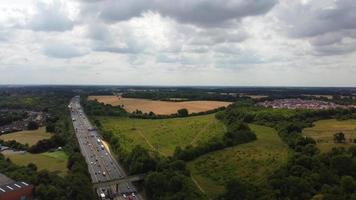 High Angle Footage and Aerial View of British Motorways at M1 Junction 9 of Dunstable and Luton England UK video