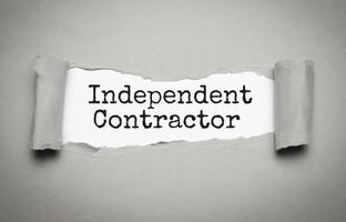 INDEPENDENT CONTRACTOR text on white torn paper photo