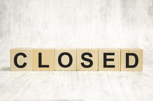closed word abstract in wooden blocks. concept photo