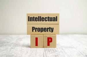 On the wooden blocks with the inscription - intellectual property photo