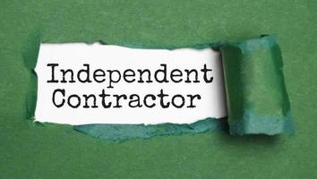 INDEPENDENT CONTRACTOR text on white torn paper photo