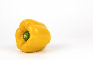 Fresh yellow sweet bell pepper path isolated on white background for meal creating concepts photo