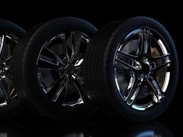 auto wheel with chrome disks close-up on a dark background. 3d render photo