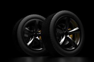 auto wheel with chrome disks close-up on a dark background. 3d render photo