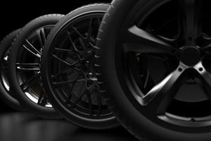 auto wheel with chrome disks close-up on a dark background. 3d render photo