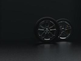 auto wheel with chrome disks close-up on a dark background. 3d render photo