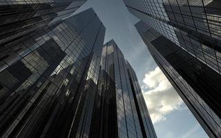 modern high-rise buildings against the sky. 3d illustration on the theme of business success and technology photo