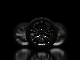 auto wheel with chrome disks close-up on a dark background. 3d render photo